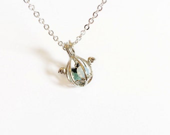 angel egg necklace with wings in silver