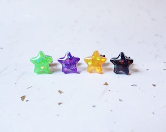 halloween stars resin glitter earrings, black, purple, green, or orange. stainless steel posts OR clip ons