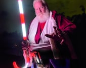 Santa Saber: Double-Bladed Candy Cane Saber with Sound Effects