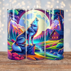 May include: A stainless steel tumbler with a colorful design of a wolf howling at the moon in a forest setting. The design includes a cabin, trees, and a river.