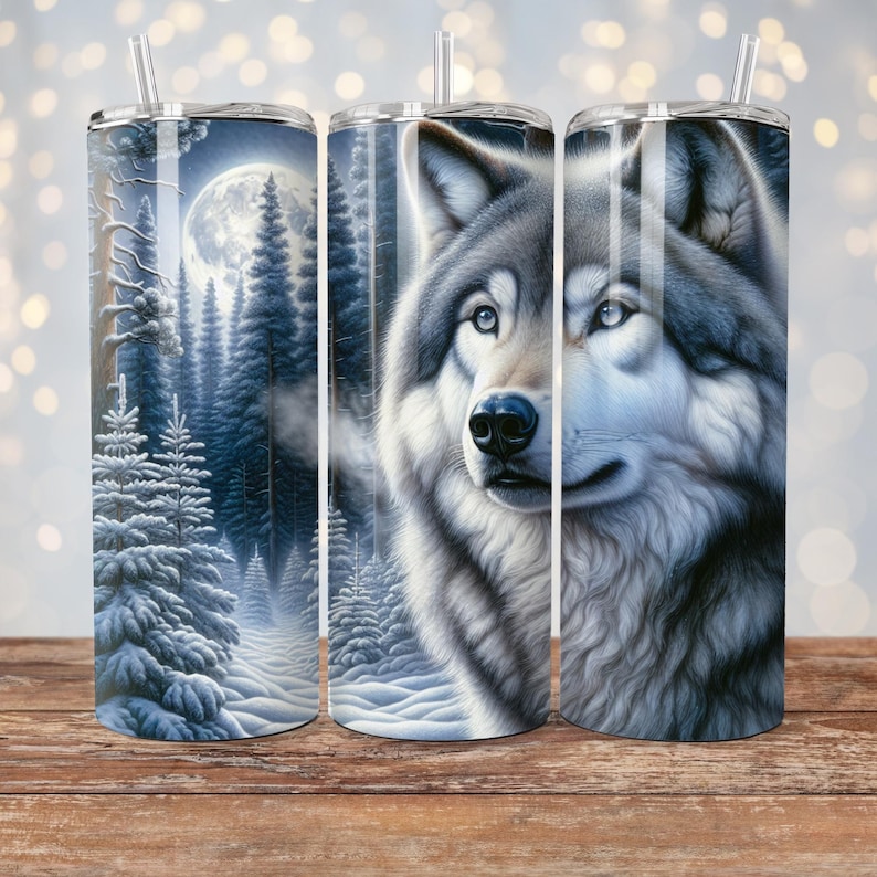 May include: Three stainless steel tumblers with a wolf design. The wolf is gray and white and is looking to the right. The background of the tumbler on the left is a snowy forest with a full moon. The background of the tumblers on the right is a snowy forest.