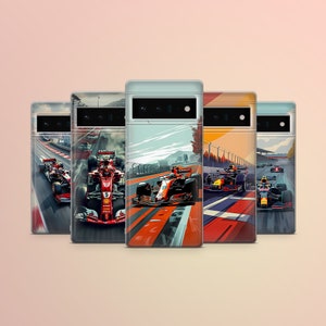 May include: Five phone cases with different Formula 1 racing car designs. The cases are black with a clear plastic back showing the design. The designs feature red, blue, and yellow race cars on a white background.