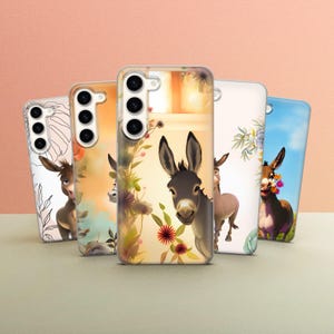 May include: Five phone cases featuring a donkey design. The cases are all in different colours and have varying floral patterns. The donkey is brown with a white stripe down its back. The cases are all made of clear plastic.