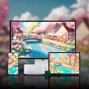 May include: A digital illustration of a small town with a river running through it. The town is surrounded by cherry blossom trees and the river is filled with pink and white flowers. The image is displayed on a computer monitor, a tablet, and a smartphone.