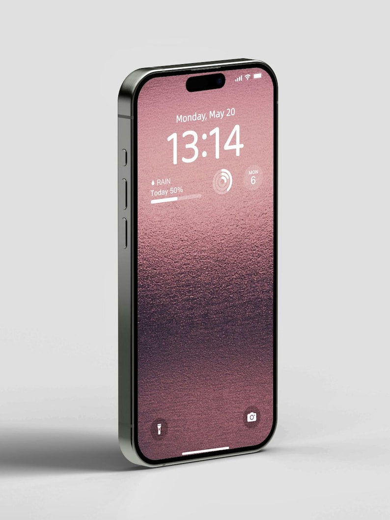 a pink and black cell phone with the time displayed