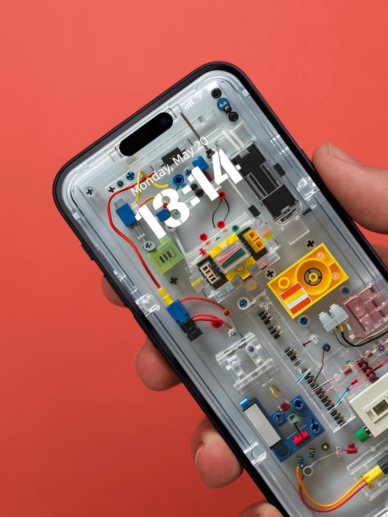 a person holding a cell phone in their hand