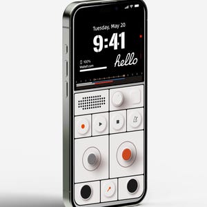 May include: A smartphone with a white and black interface showing a digital clock with the time 9:41 and the word "hello" on the screen. The interface also includes a series of buttons and a dial.