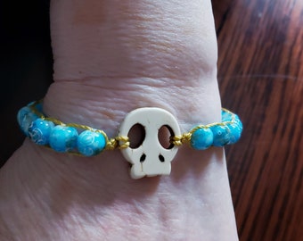 Skull gold blue and white adjustable macrame bracelet