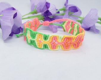 Friendship bracelet neon color sleeping tiki design adjustable