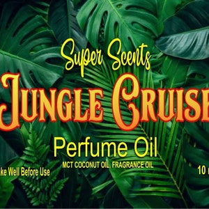 May include: A green and yellow label with the text "Super Scents Jungle Cruise Perfume Oil" and "MCT Coconut Oil, Fragrance Oil" and "Shake Well Before Use" and "10 mil".