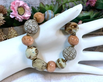 Chunky and Rustic Handmade Ceramic Beads and Bronze Beaded Stretch Bracelet 7&quot; Brown, Cream, Rust, Orange, Blue