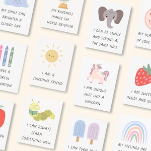 Może przedstawiać: Zbiór ilustrowanych kart z pozytywnymi afirmacjami. Każda karta zawiera kolorową grafikę i krótką, podnoszącą na duchu wiadomość, np. "Jestem przyjacielem słońca" lub "Moje serce jest pełne miłości do dzielenia się."