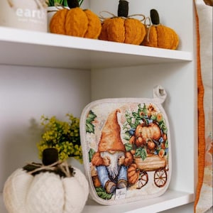 A fun Halloween-themed oven mitt and potholder, gnome kitchen decor, Halloween gift, Halloween kitchen decoration.