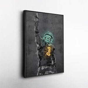 May include: A framed art print of a football player in a black uniform, raising a finger. The helmet and the number 1 on the jersey glow with neon green and yellow light against a dark gray background.