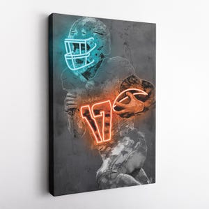 May include: A digital painting of an American football player wearing a helmet with neon blue accents and a jersey with the number 17 in neon orange. The player is holding a football and is running with the ball. The background is a gray textured surface.