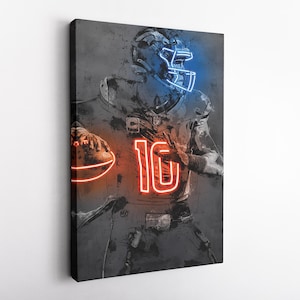 May include: A digital art print of an American football player wearing a jersey with the number 10 in neon red. The player is holding a football in their left hand. The background is a gray, textured surface.