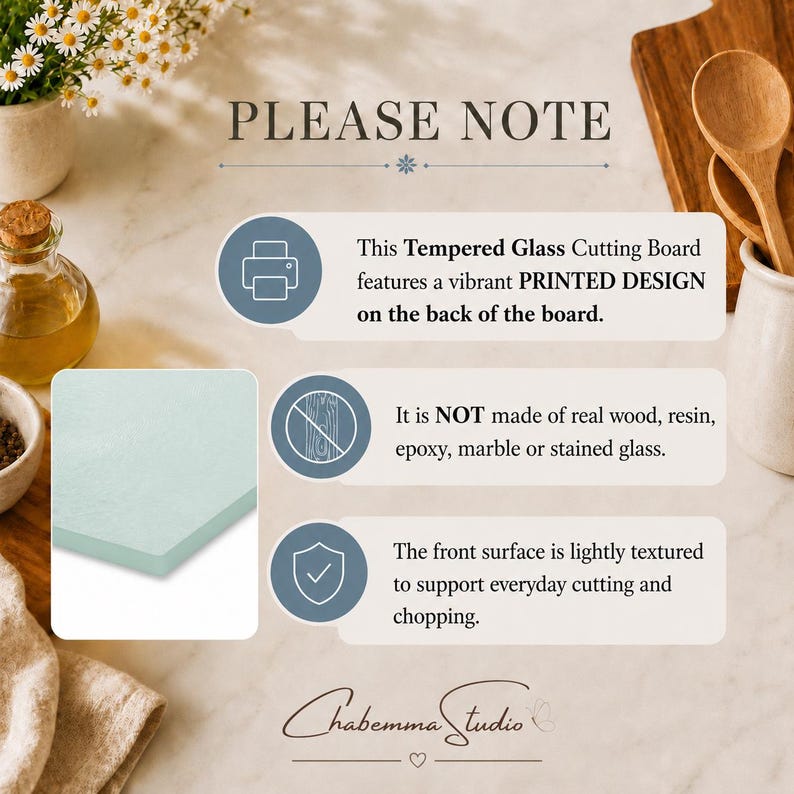 May include: An informational graphic titled PLEASE NOTE explaining that the tempered glass cutting board features a vibrant printed design on the back, is not made of real wood, resin, epoxy, marble, or stained glass, and has a textured front.