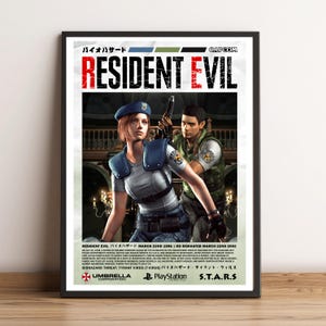 May include: A framed poster featuring the Resident Evil video game artwork. The image displays two characters in tactical gear, with the title Resident Evil in bold red and black text at the top, and detailed game information printed at the bottom.
