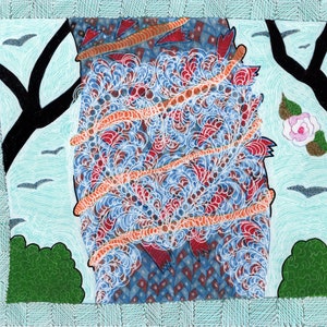 May include: A square art print featuring a central blue patterned form wrapped in orange bands and white swirling lines. The background displays a light blue sky with black tree silhouettes, green bushes, small birds, and a single pink flower.