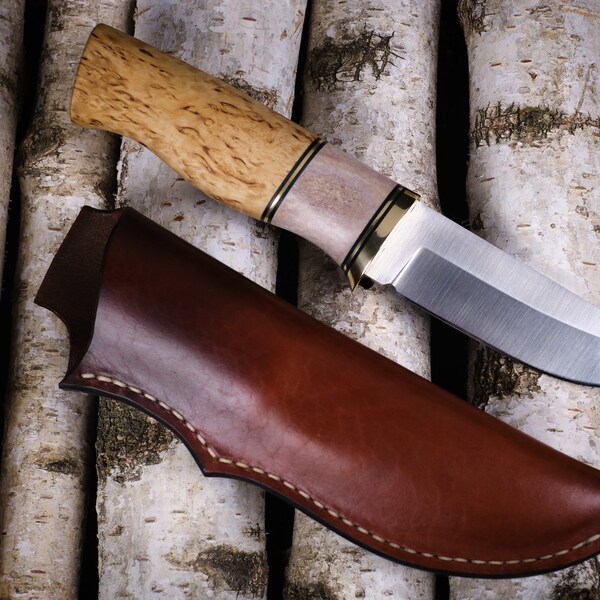 Outdoor and hunting knife with reindeer antler and curly birch handle made of carbon steel 80CrV2 with leather sheath and wood inlay