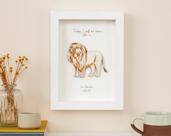 May include: White wooden frame with a lion cutout inside. The text inside the frame reads "Today I will be brave like a..." and is signed "Leo Harrison 2.06.23".