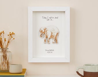 May include: White framed print with a wooden cutout of an elephant. The print says "Today I will be kind like an..." and "Daisy Matilda 5.09.24".