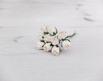 10, 1.5 cm off white rose buds with wire stems, 15mm off white ivory flowers