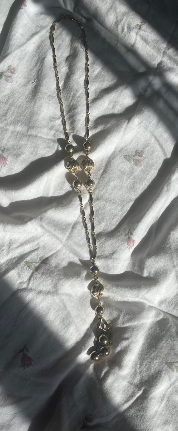 Vintage gold toned long necklace