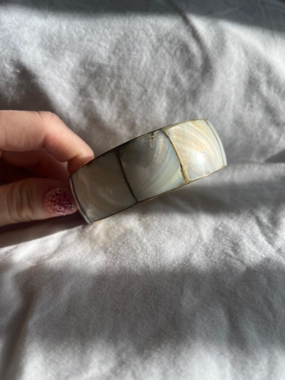 Vintage gold toned mother of pearl bangle