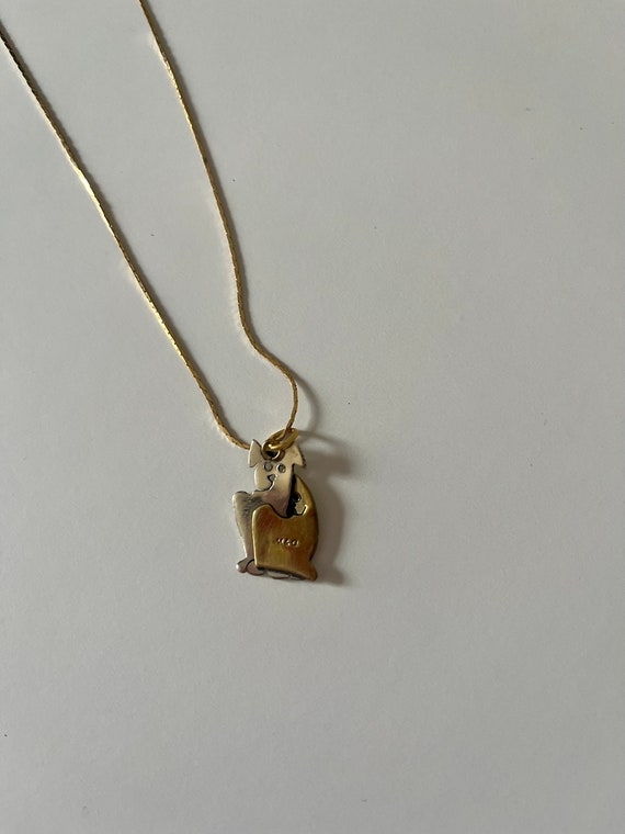 Silver and gold toned dog and cat pendant necklace - image 3