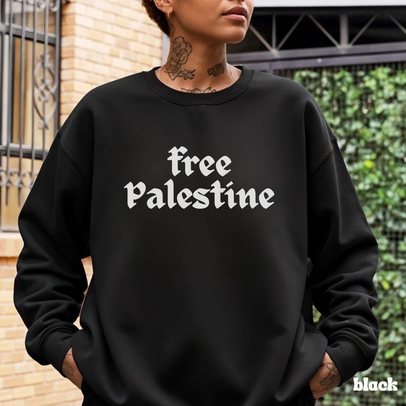 Solidarity Movement Support Apparel Protest Wear Awareness Statement Human Rights Activist Clothing Comfortable Crewneck Design Cotton Polyester Blend Ribbed Collar Construction No Side Seams Quality Durable Fabric Statement Making Garment