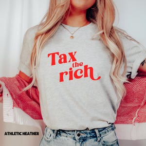 Progressive Movement Shirt Eat Rich Tee Political Statement Apparel Social Justice Clothing Equality Message Expression Activist Fashion Bold Graphic Design Unisex Fit Comfortable Wear Daily Style Conversation Starter Statement Piece