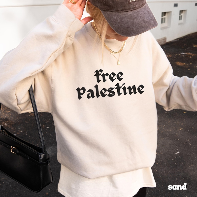 Human Rights Activist Clothing Solidarity Movement Support Apparel Protest Wear Awareness Statement Cotton Polyester Blend Crewneck Comfortable Design Statement Making Piece Social Justice Support Wear Meaningful Message Garment Quality