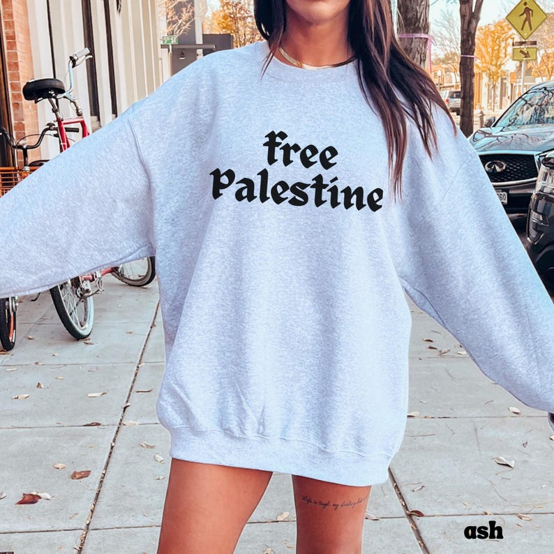 Statement Making Design Human Rights Activist Clothing Solidarity Movement Support Apparel Cotton Polyester Blend Crewneck Comfortable Wear Ribbed Collar Construction No Side Seams Quality Durable Fabric Social Justice Support Casual