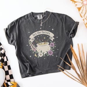 Political Protest Shirt Activist Movement Clothing Vintage Style Graphic Tee Social Justice Rally Wear Cotton Boxy Design Cropped Style Comfortable Fabric Quality Bold Statement Apparel Progressive Message Expression Resistance Fashion