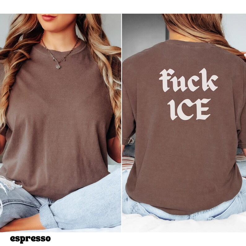 May include: Espresso-colored t-shirt with the text "fuck ICE" in a bold, stylized font on the back. The front of the shirt is plain. The shirt is a relaxed fit, suitable for casual wear.