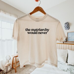 Matriarchy Activist Statement Shirt Feminist Cotton Tee Equality Movement Clothing Rights Support Message Protest Rally Wear Comfortable Boxy Design Vintage Style Look Quality Ring Spun Material Heavy Fabric Construction Durable Daily Wear Perfect