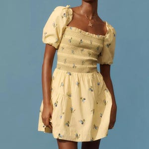 Anthropologie Puff Sleeve Smocked Mini Dress Butter Yellow Floral Large image 1
