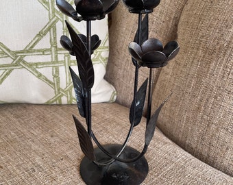Pained metal candleholder with flowers and leaves