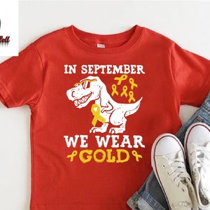 Trex Childhood Cancer Awareness Shirt,Childhood Cancer Toddler Shirt,Child Cancer Fighter Gift Shirt,Pediatric Cancer Tee,Gold Ribbon Tshirt