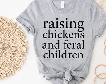 Raising Chickens and Feral Children T-Shirt,Funny Farm Mom Tee,Chicken Farmer T-Shirt,Homesteading Life,Country Mama Gift,Farm Mama Apparel