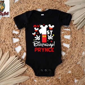 a black bodysuit with mickey mouse on it