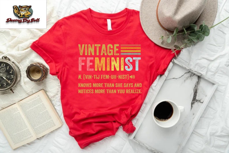 a red shirt with the words vintage feminist on it