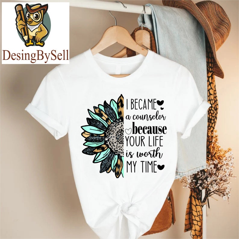 a white t - shirt with a sunflower on it