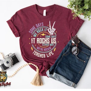 a women's t - shirt with the words rock'n'roll on