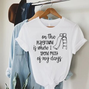 a t - shirt that says on the playground is where i spend most of my