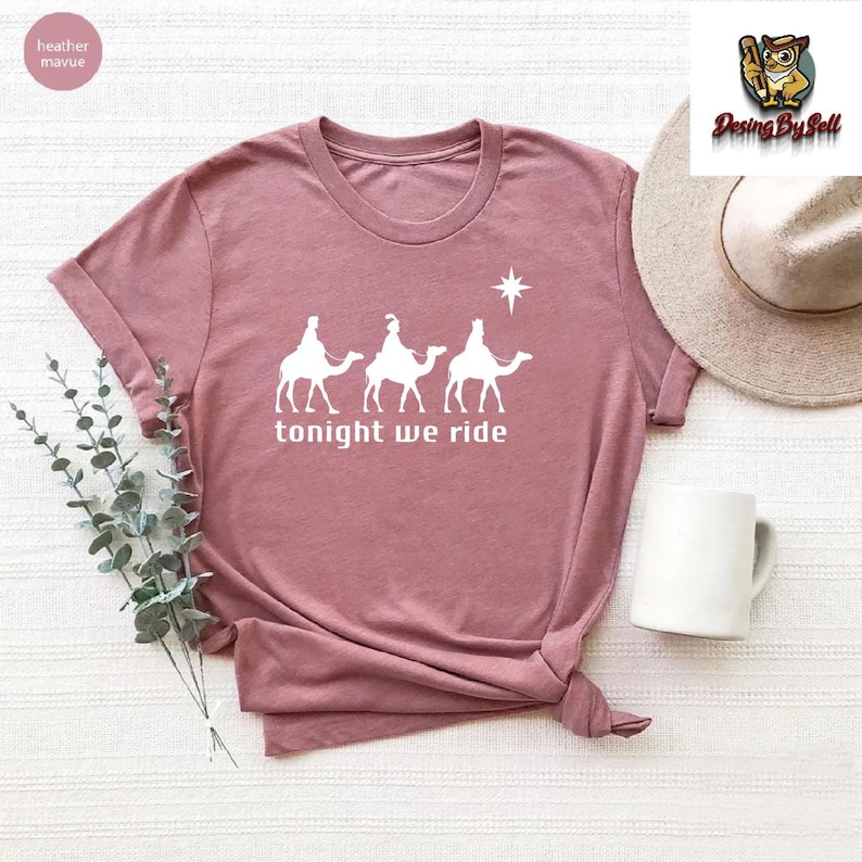 a t - shirt that says tonight we ride