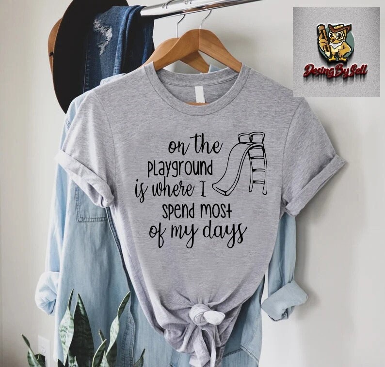 a t - shirt that says on the playground is where i spend most of my