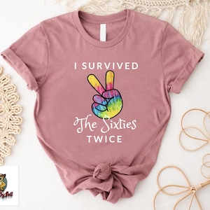 a t - shirt that says i survived the sixties twice