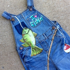 Custom Fishing Theme Painted Denim Overalls for little kids photo prop clothing featuring fish, bucket, bobbers, poles, sunshine, birthday